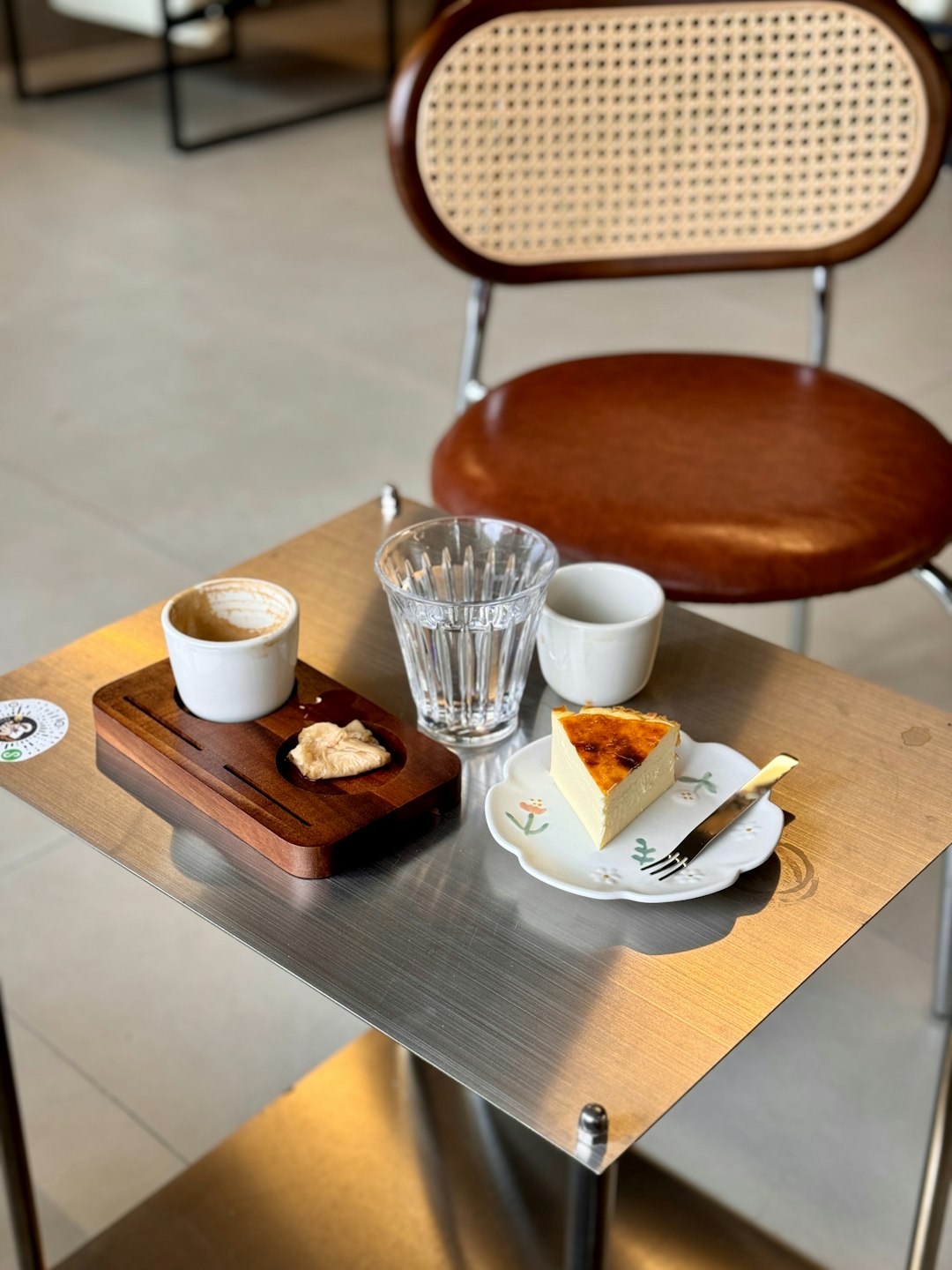 Sleek modern square dining table in a caf&eacute;