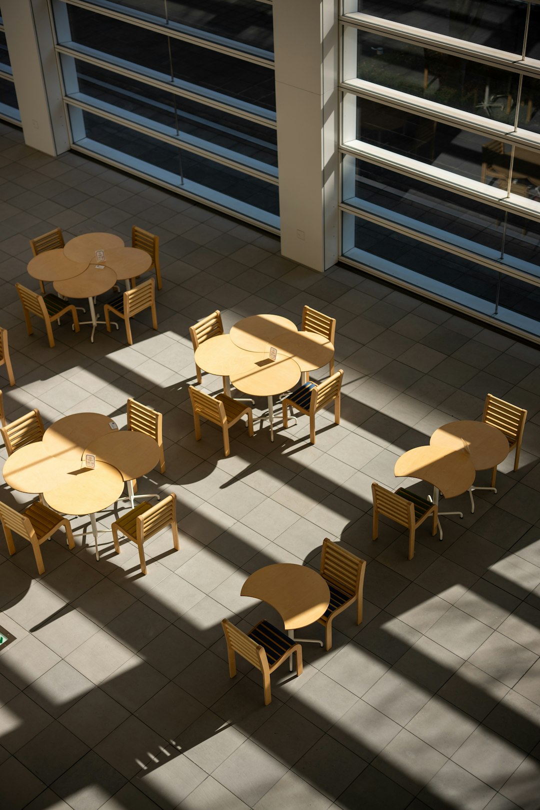 Cafeteria staff cleaning tables