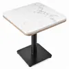 Side detail of restaurant tabletop with quartz surface and wood-veneered multilayer plywood