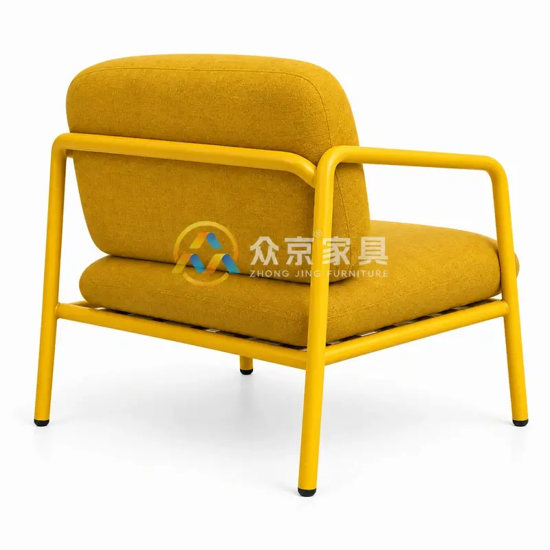 Yellow metal frame armchair with upholstered seat, curved tubular arms and 600×720×780mm dimensions
