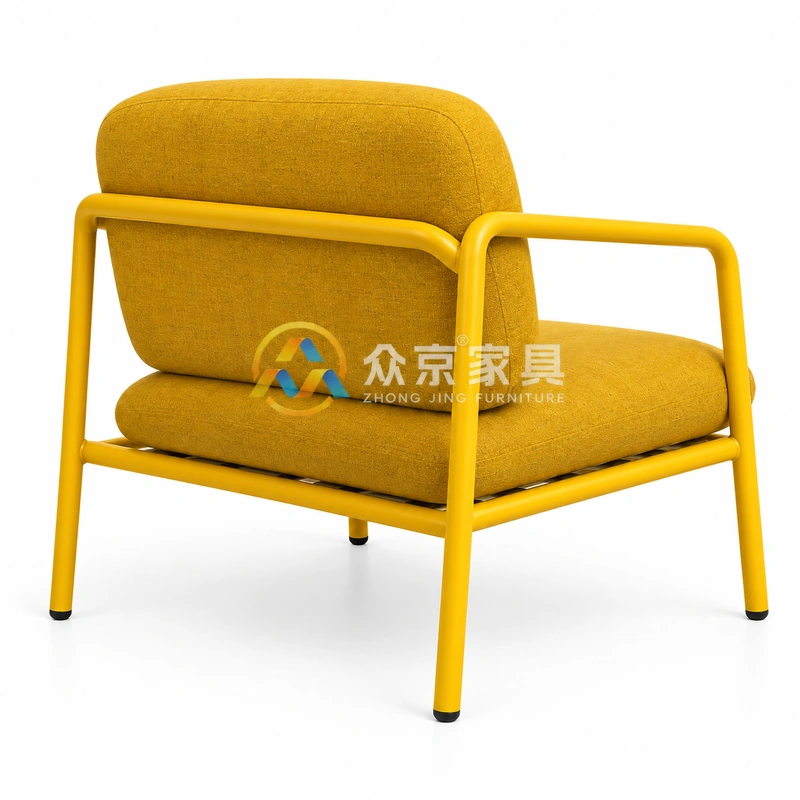 Yellow metal frame armchair with upholstered seat, curved tubular arms and 600×720×780mm dimensions