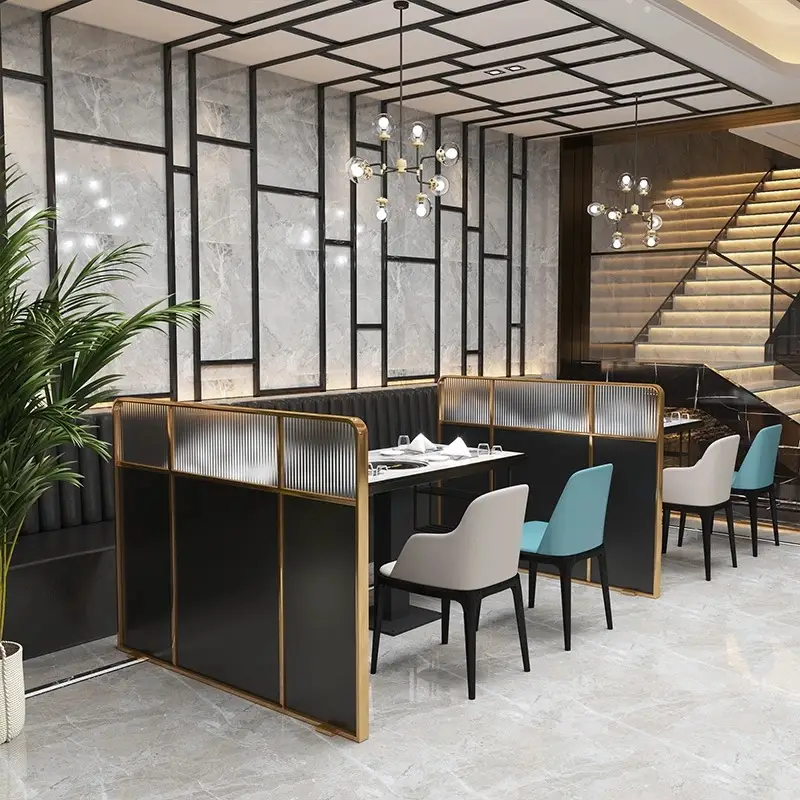Commercial dining room layout utilizing strategic partitions for spatial organization